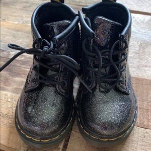 Dr. Marten black glitter toddler combat boots